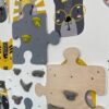 scianki wspinaczkowe puzzle w pokoju biala szara