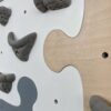 scianki wspinaczkowe puzzle w pokoju biala szara zolta